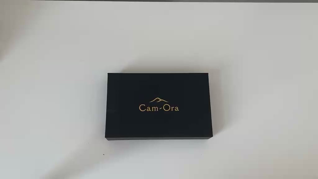 Video demonstrating the camel leather eyeglasses case holding a pair of glasses