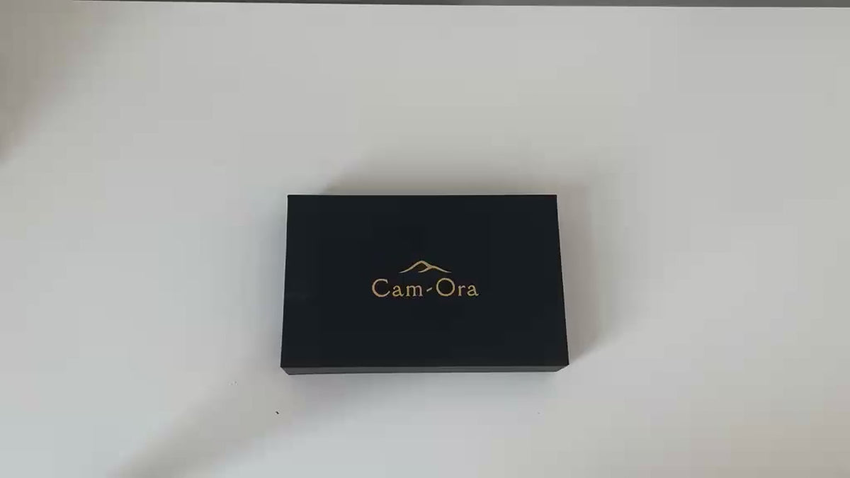 Video demonstrating the camel leather eyeglasses case holding a pair of glasses